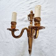 French Empire-style wall sconce or chandelier in bronze with an antique gold patina.