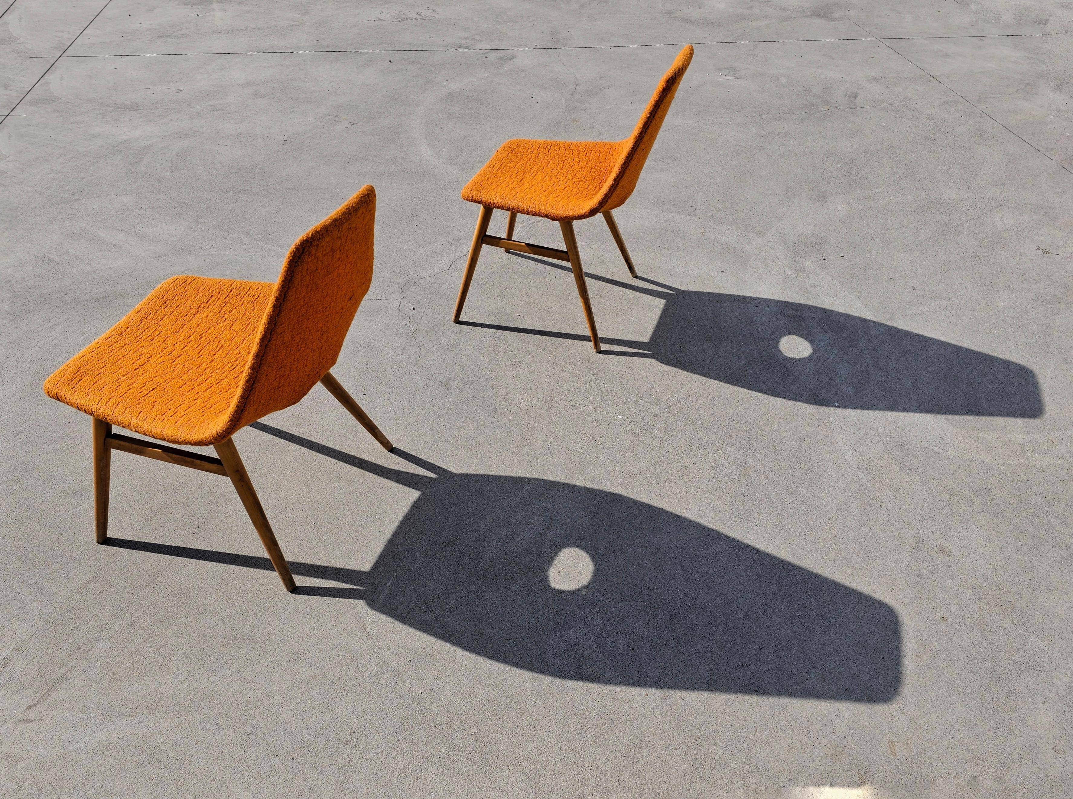 Pair of Mid-Century Modern accent chairs by Judit Burian and Erika Szek.