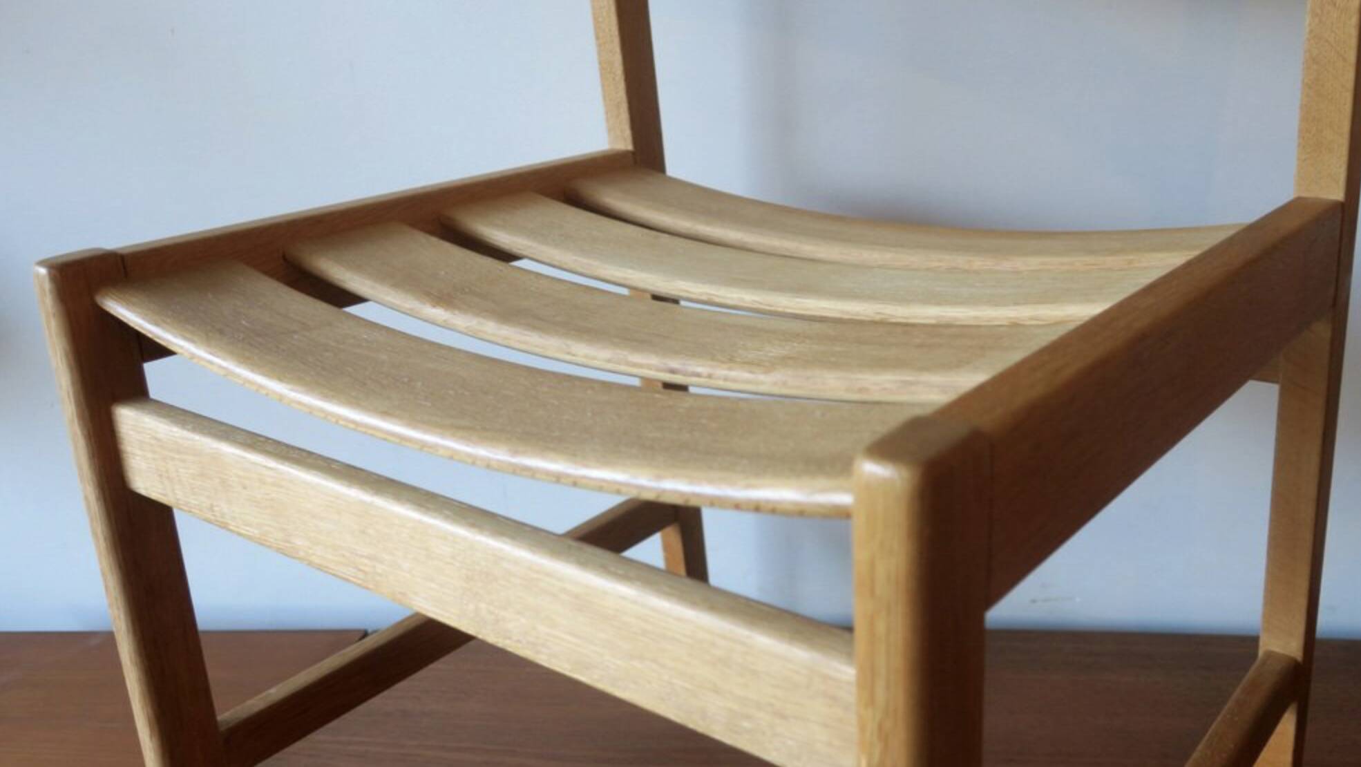 Pair of solid ash wide-seat dining chairs by Kurt Ostervig for KP Mobler, Denmark 1950s