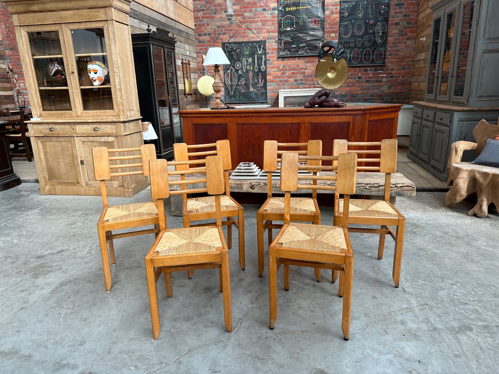 Suite of 6 Pierre Cruège chairs