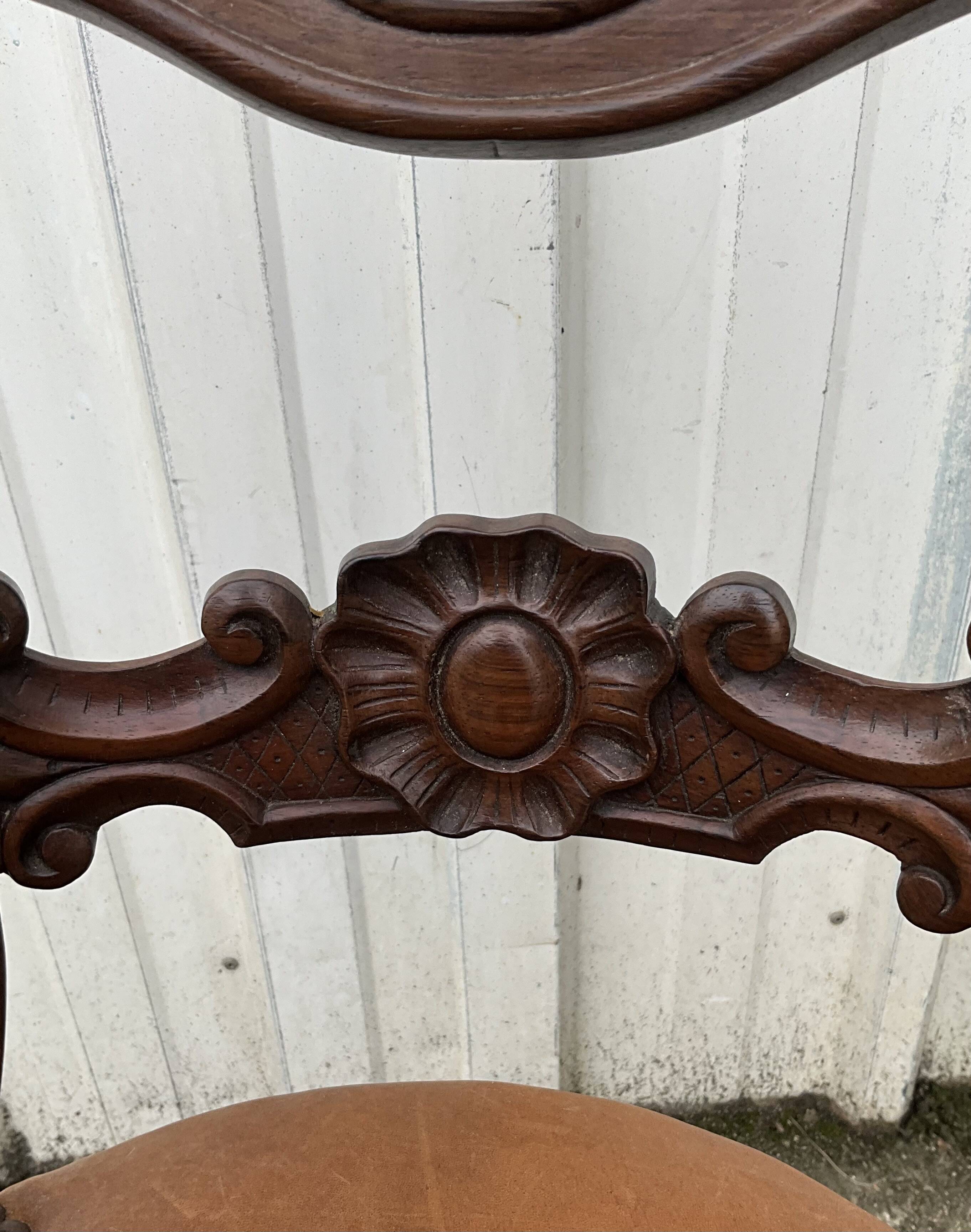 Mid-19th century solid walnut harpist's chair