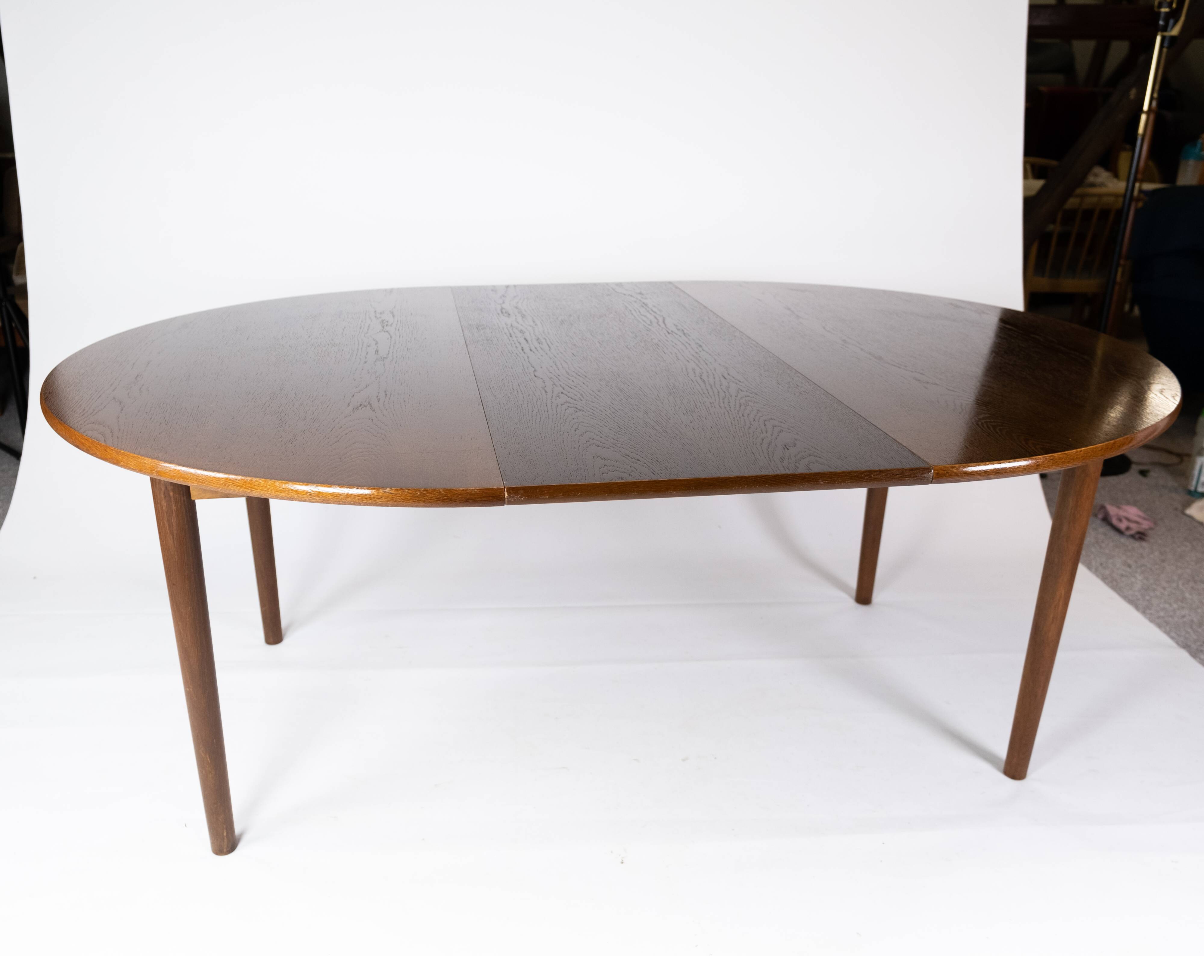 A set of four dining room chairs of teak of danish design, 1960s