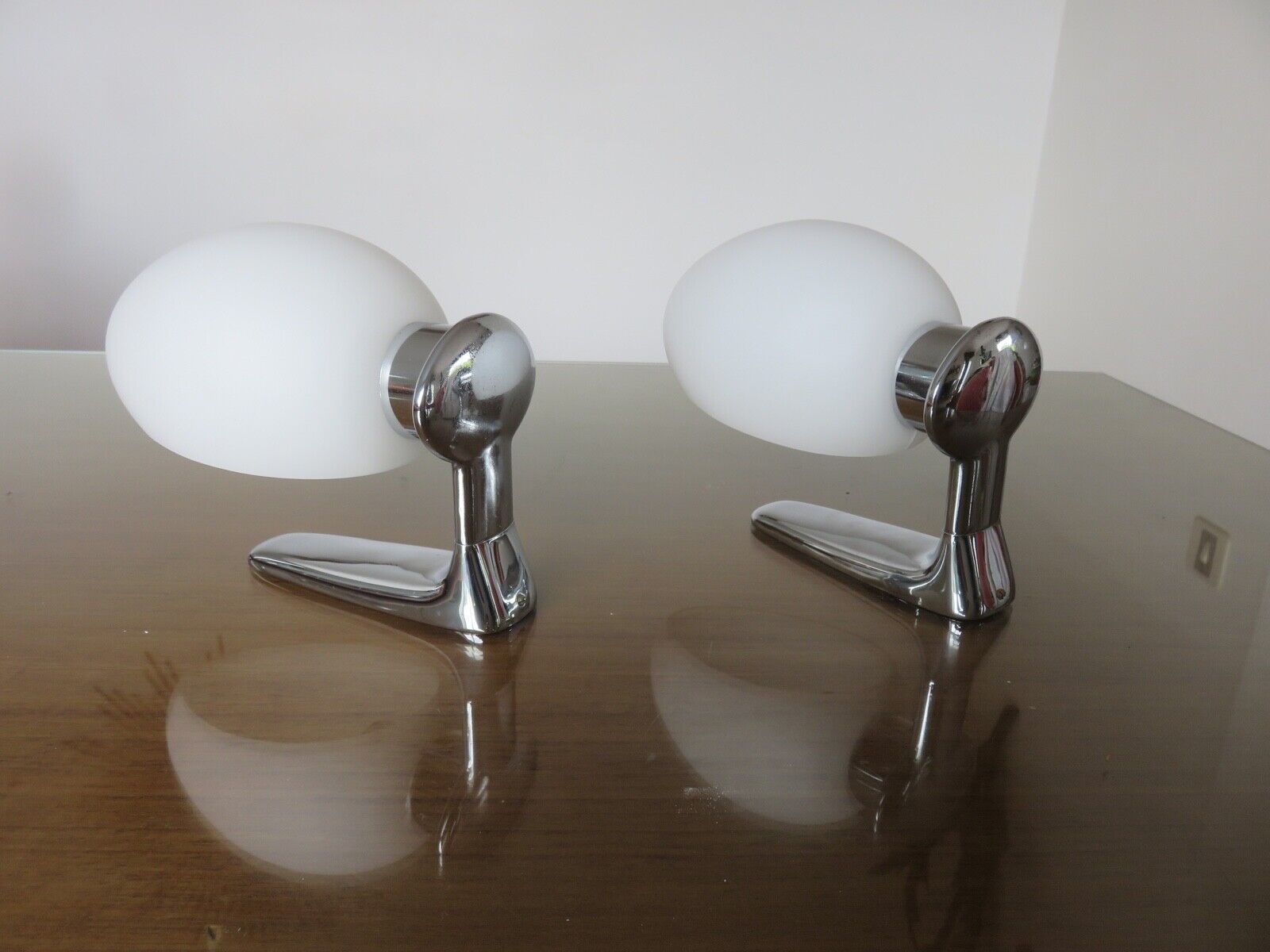 Wall lamps in chromed metal and opaline glass