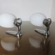 Wall lamps in chromed metal and opaline glass