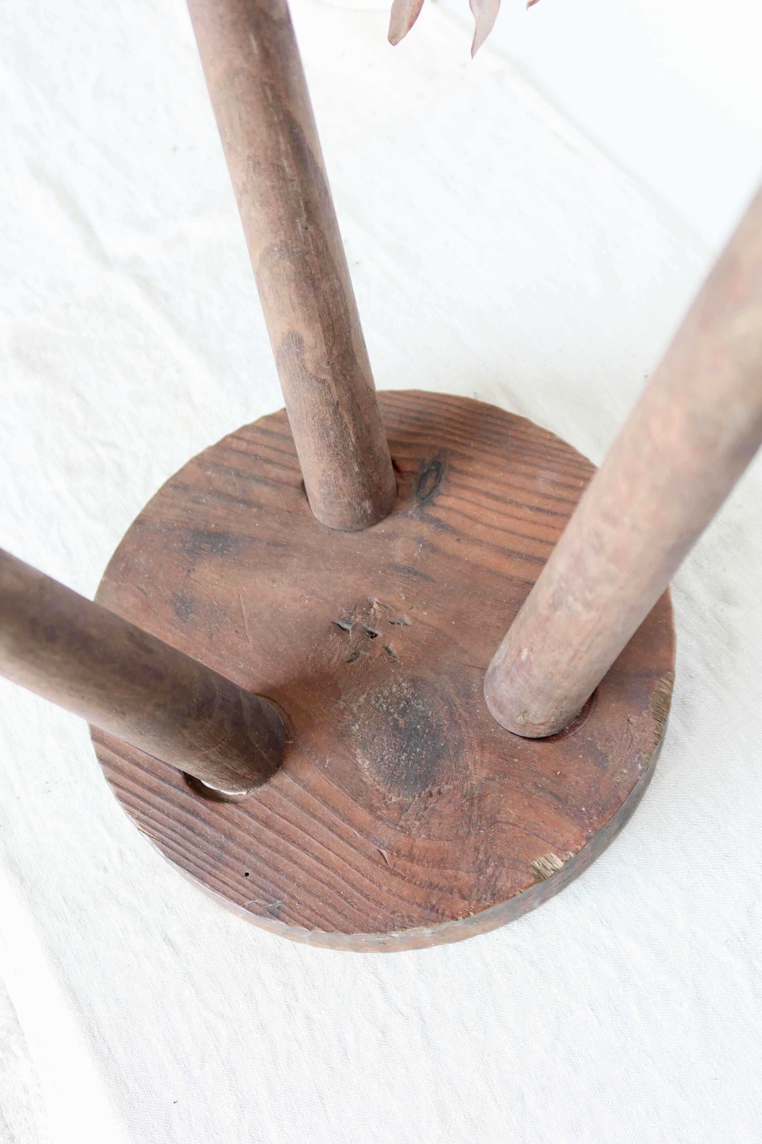 Vintage wooden tripod stool
