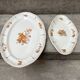 Duo of old plates Condé Longchamp – Terre de Fer, floral decoration & in