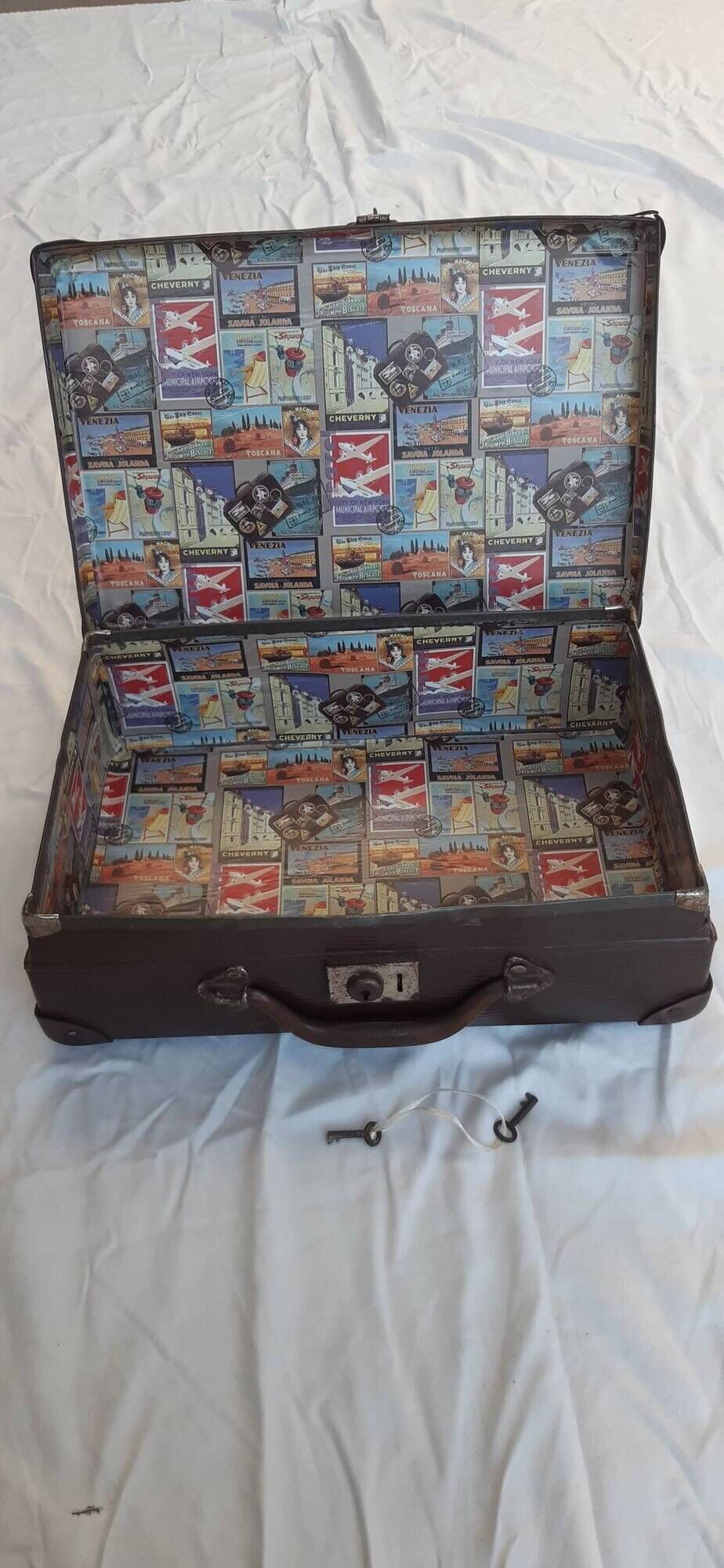 Small old suitcase with a ribbed appearance