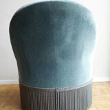 Armchair in blue velvet