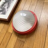 Round glass wall-mounted ceiling light porthole Prisma model Eko red.
