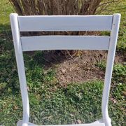 pair of white metal chairs, Tolix style