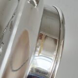 Antique butter dish in the Coquillor style, made of silver-plated metal.