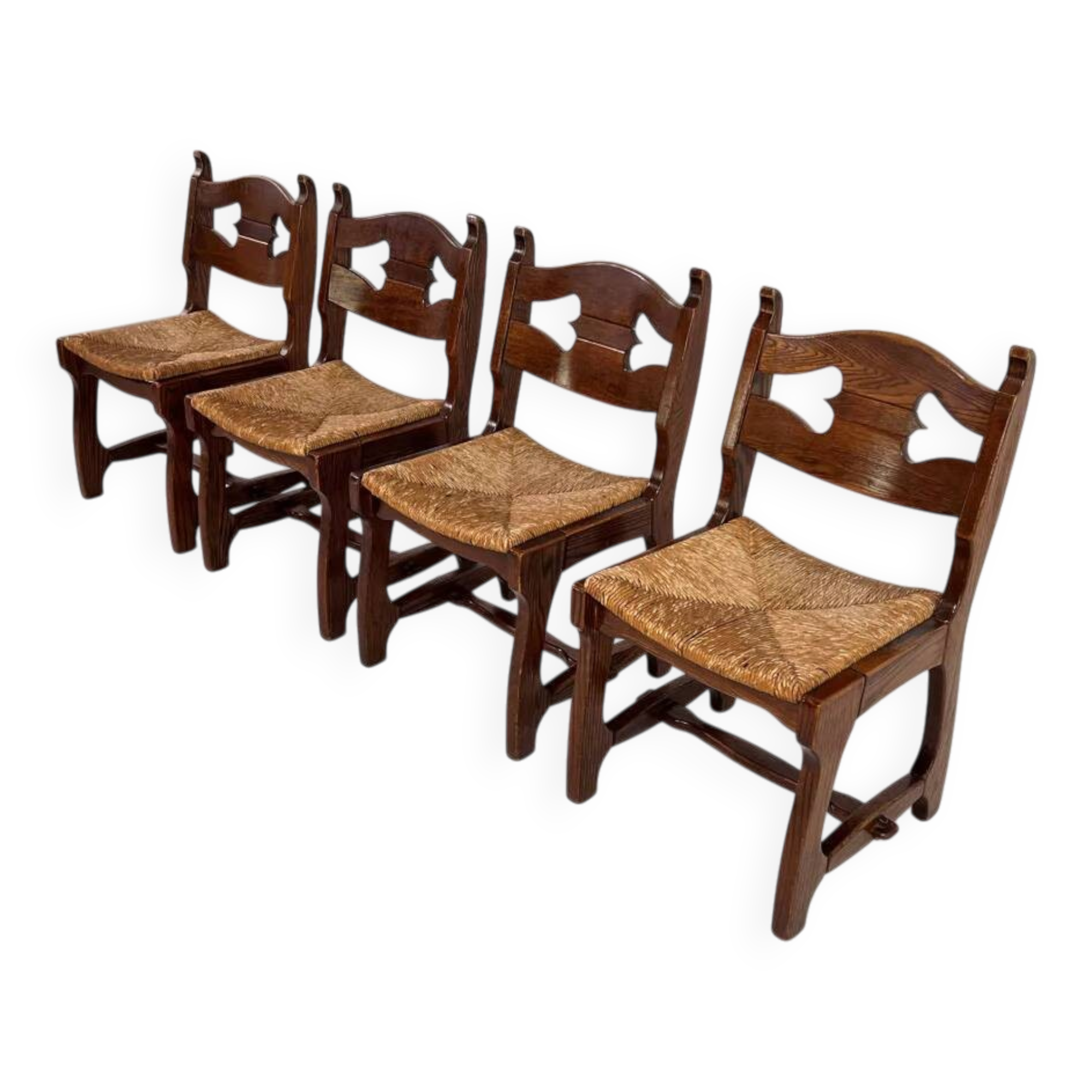 Set of 4 1950s chairs in oak with woven seats.