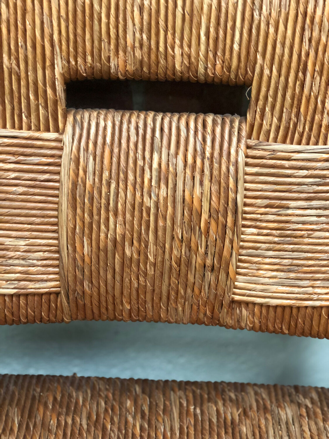 Old straw brutalist chair