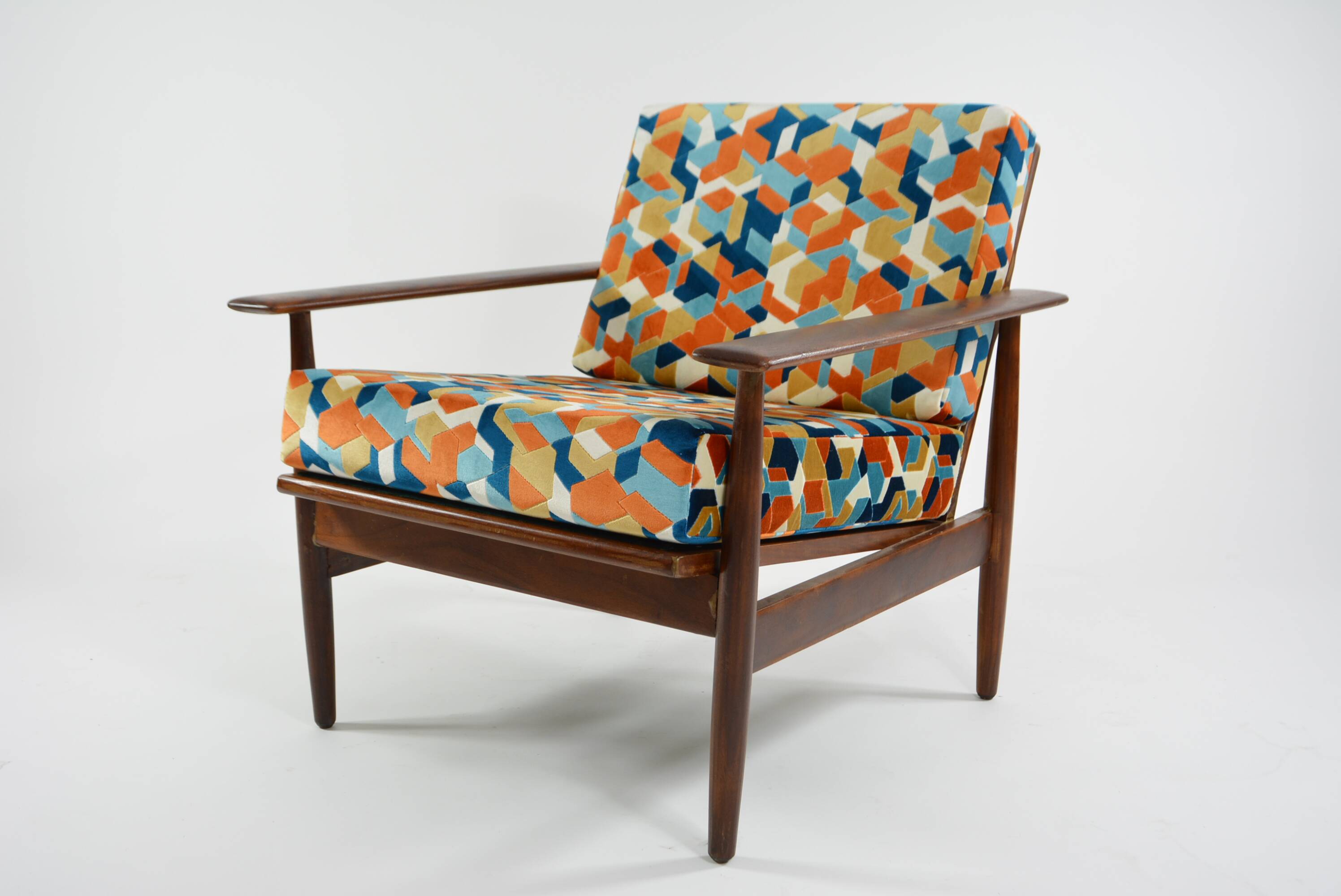 Scandinavian armchair with geometric fabric