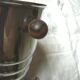 Ice in chromed metal and macassar ebony and pliers bucket
