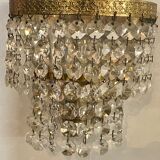 Pair of brass sconces and tassels