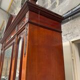 Empitre style three-door wardrobe in mahogany and 20th century veneer