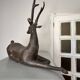 Solid bronze deer 20kg (1979), with period sales certificate.