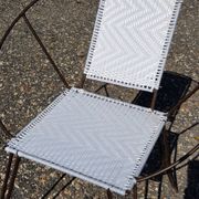 Vintage black metal armchair