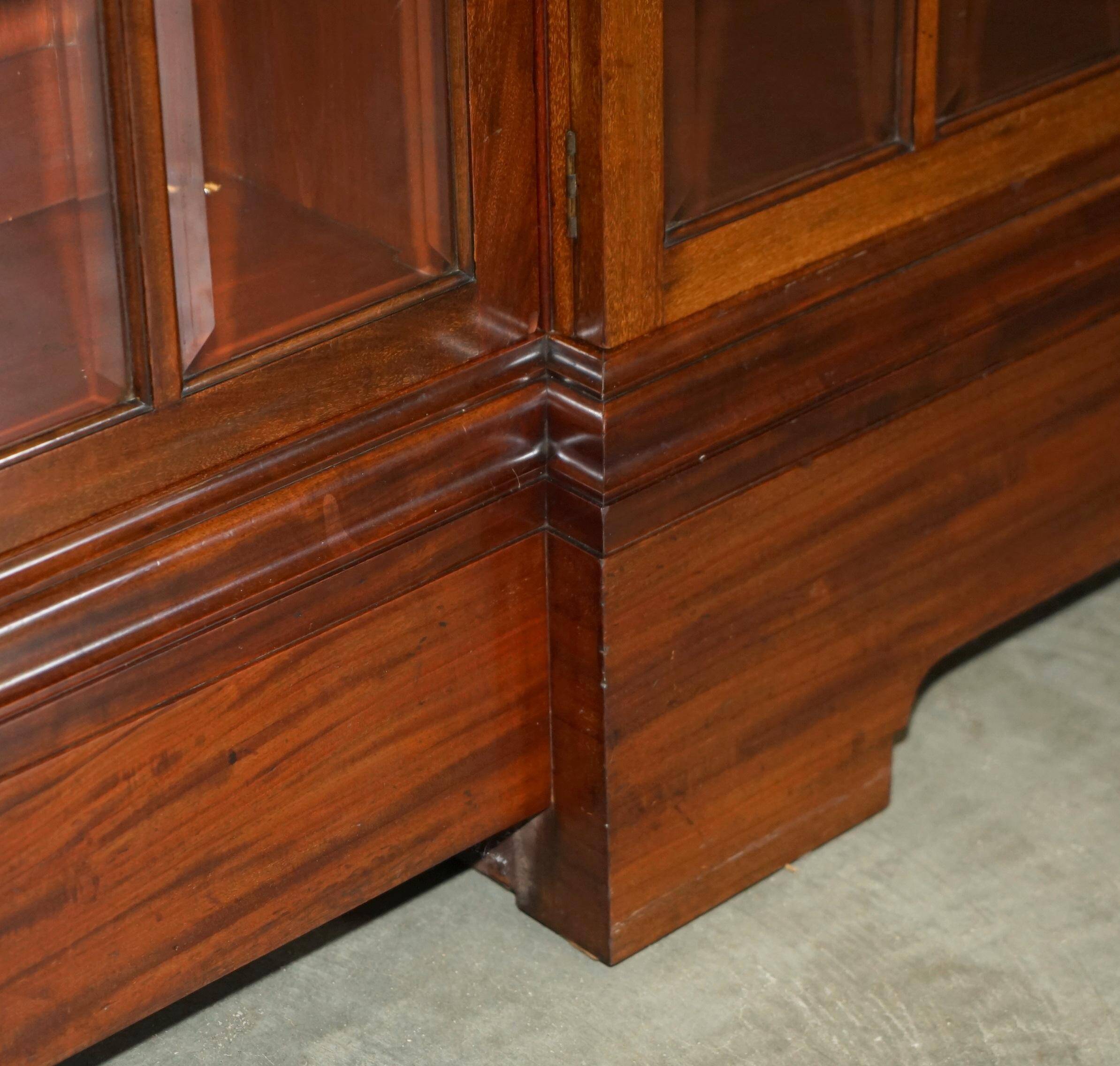Monumental glass library in Victorian hardwood.