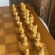 Chess set with wooden board and pieces