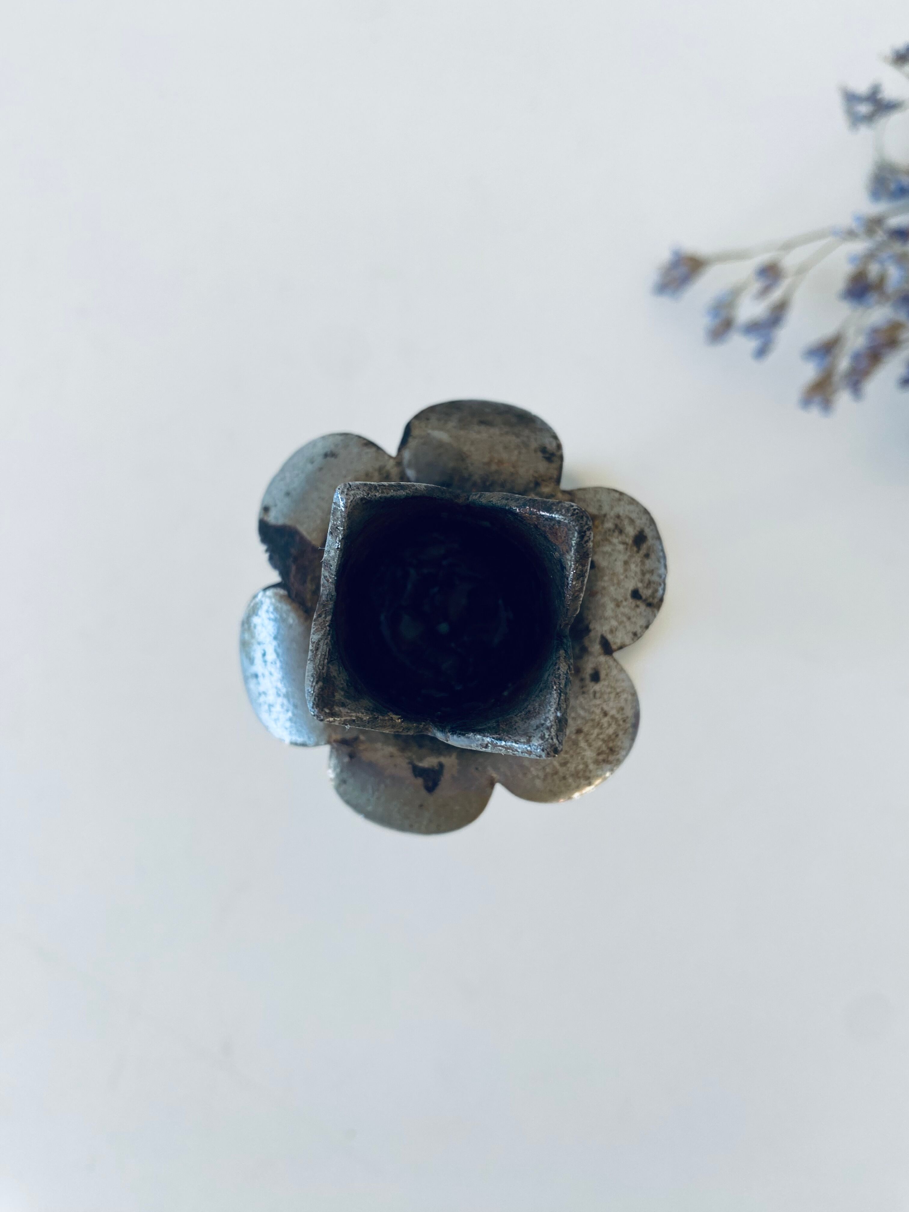 Iron flower candle holder