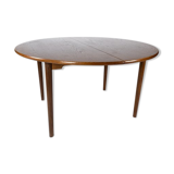 Dining table in dark oak of danish design from the 1960s.