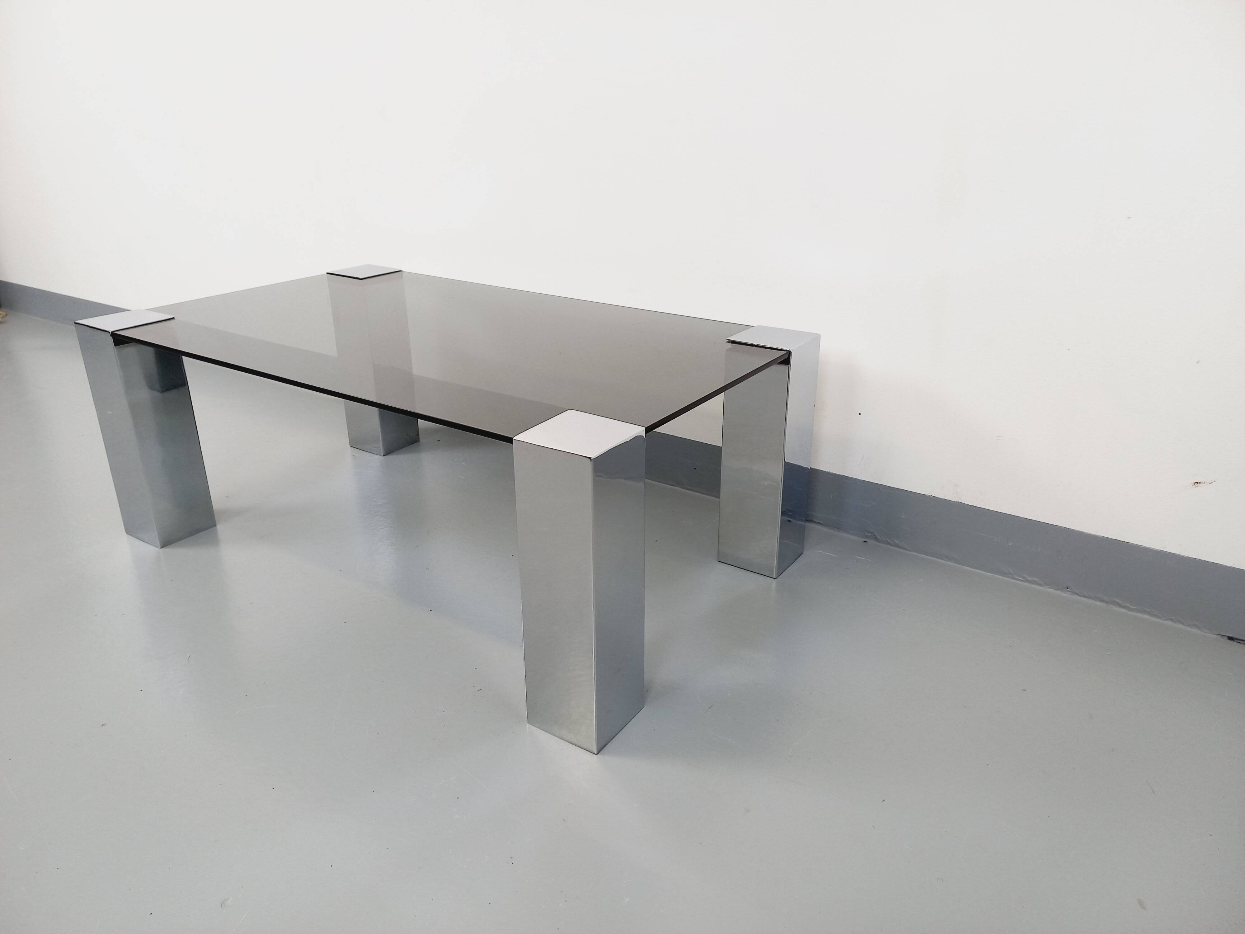 Vintage Italian coffee table Cidue in smoked glass and chrome metal from the 70s