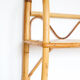 Rattan wall shelf