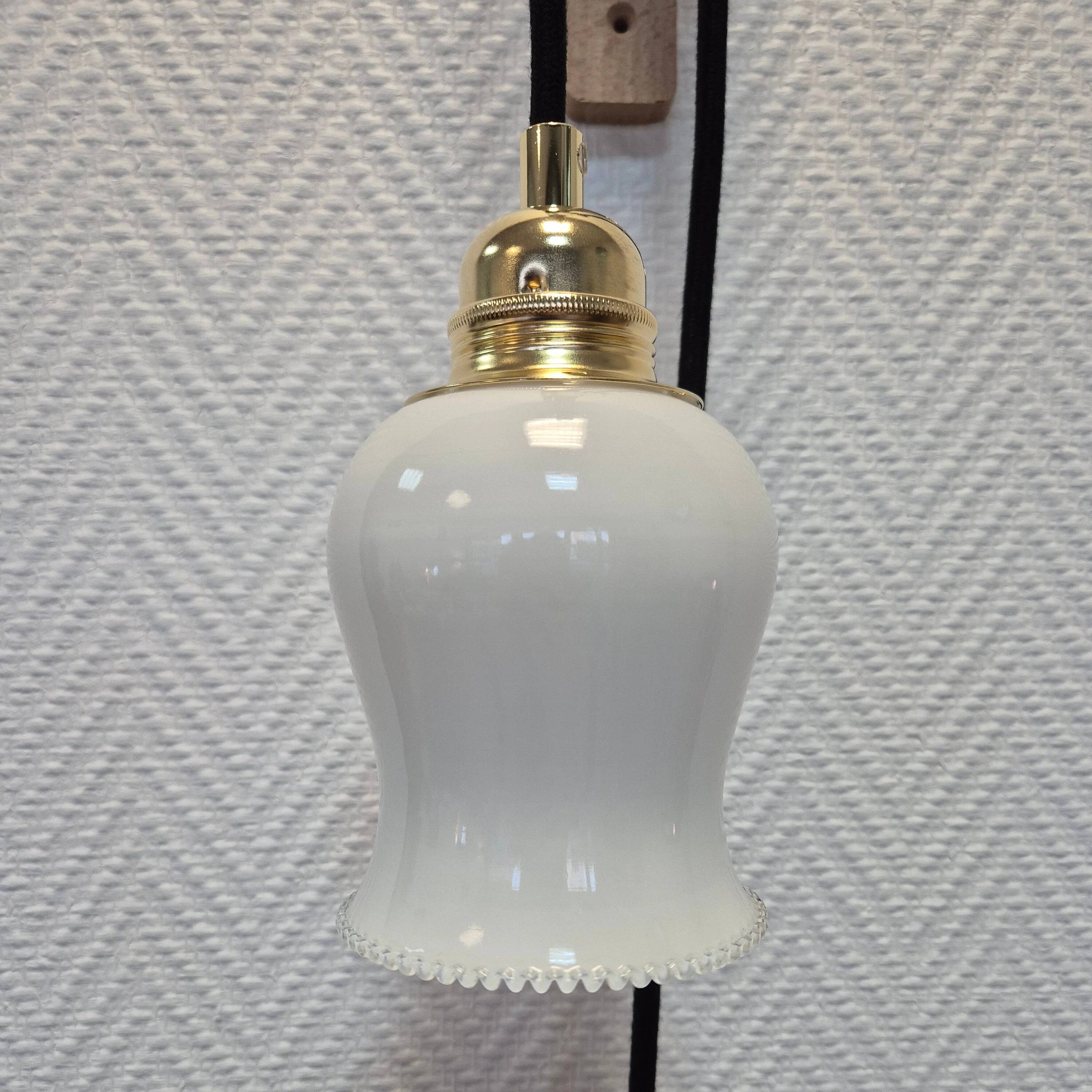Suspended glass lantern in antique style
