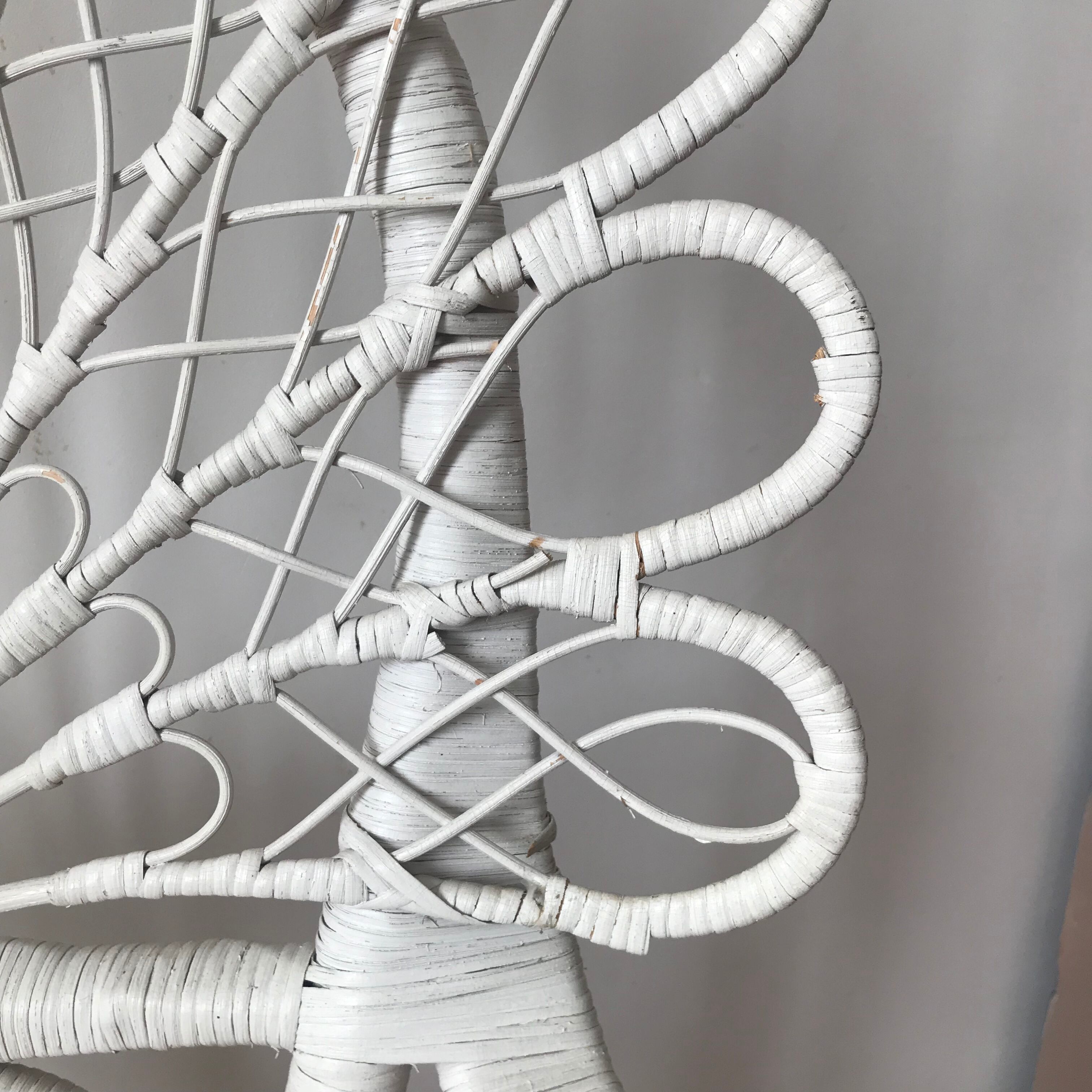 White peacock rattan chair