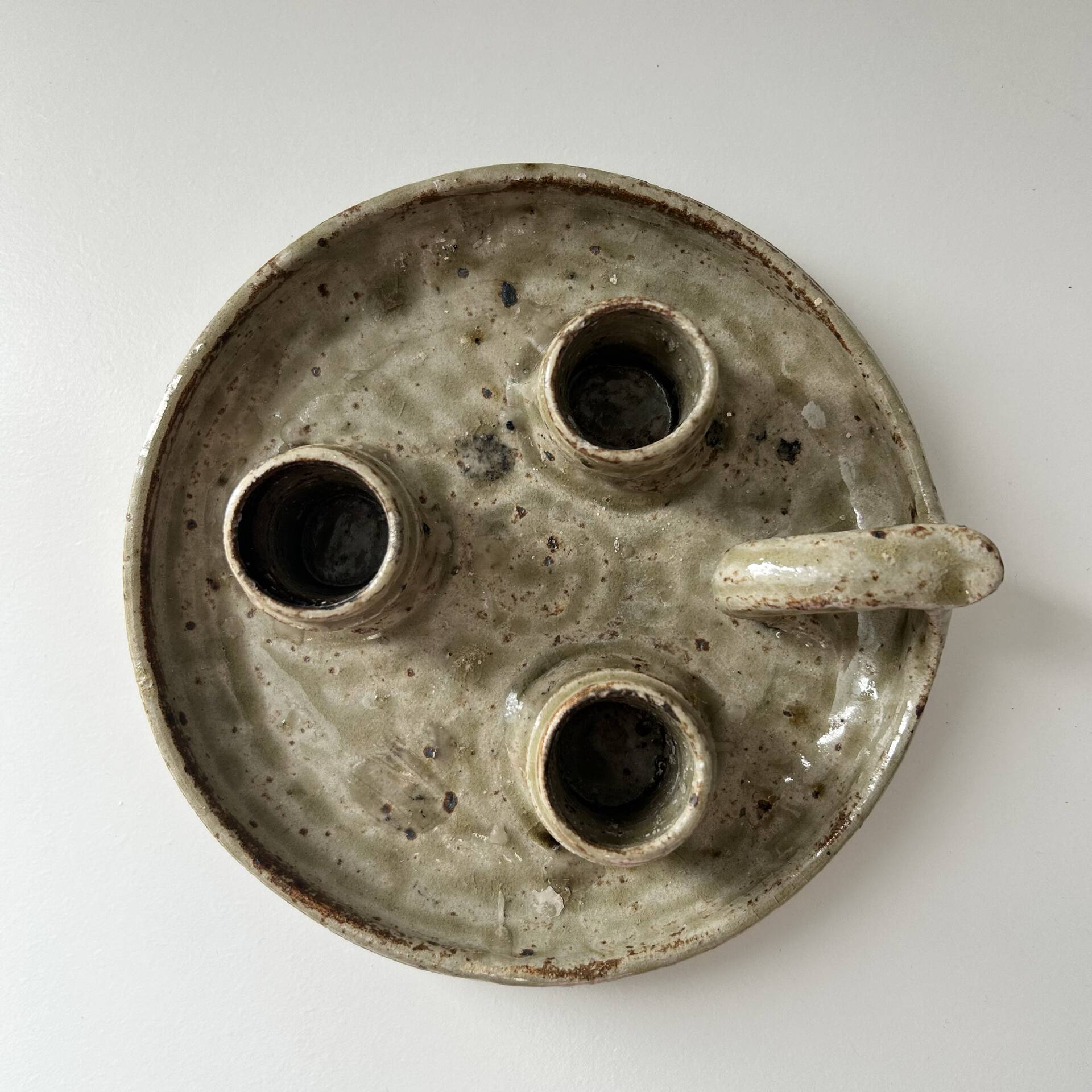 Unusual candlestick with 3 candle holders