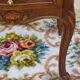 Louis XV bedside table in walnut, 3 drawers, raised edges on the tops.