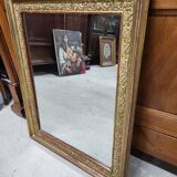 19th century gilt mirror with flowers and foliage decor