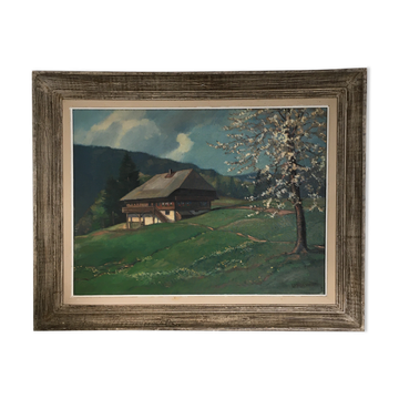 Old cottage and flowering tree table