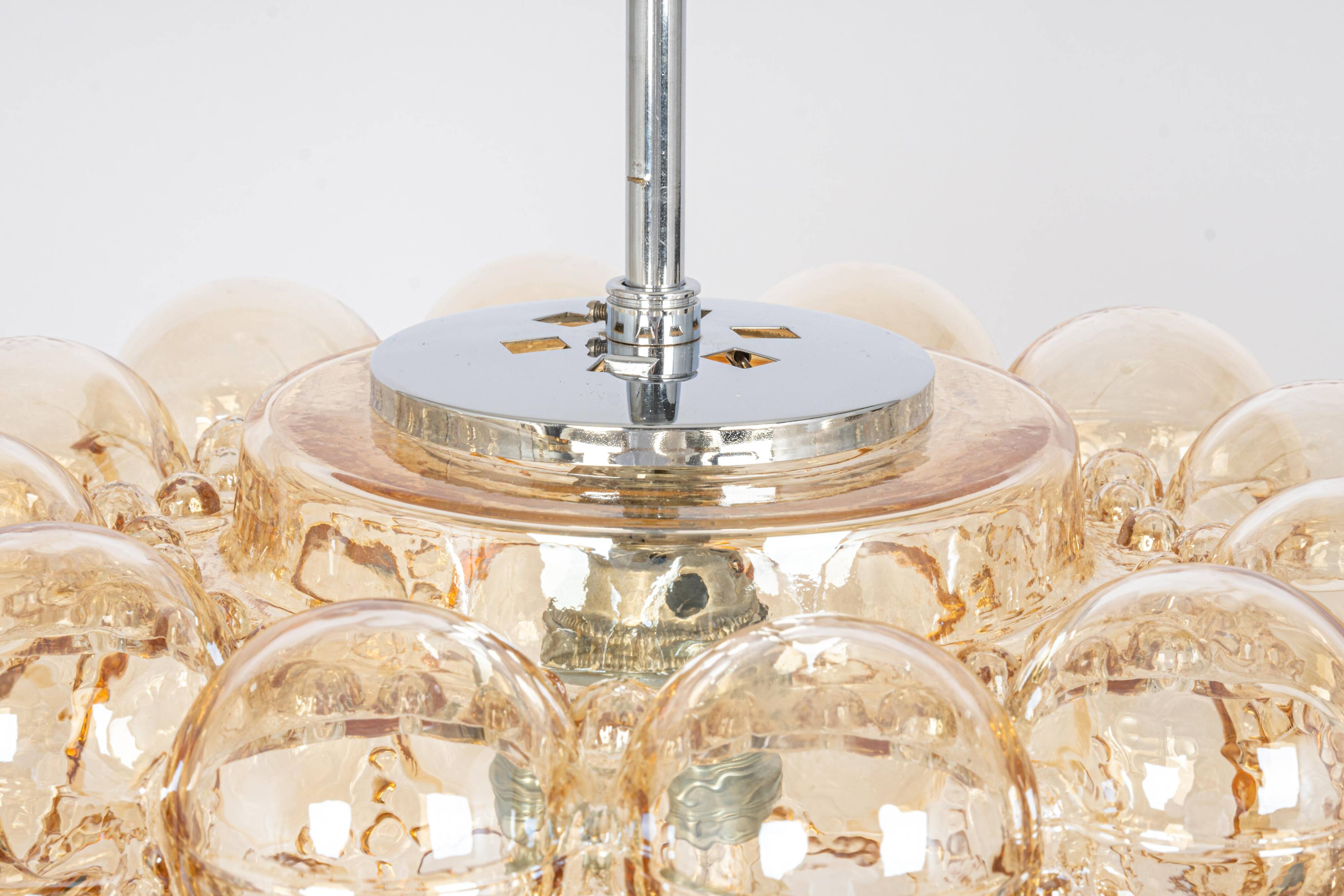 Large amber bubble glass pendant light by Helena Tynell for Limburg, Germany, 1970s.