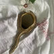 Patinated wooden Florentine hand mirror