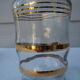 Golden liqueur service from the 1950s-1960s and its 12 glasses.