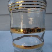 Golden liqueur service from the 1950s-1960s and its 12 glasses.