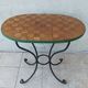 Bistro table in wrought iron and walnut