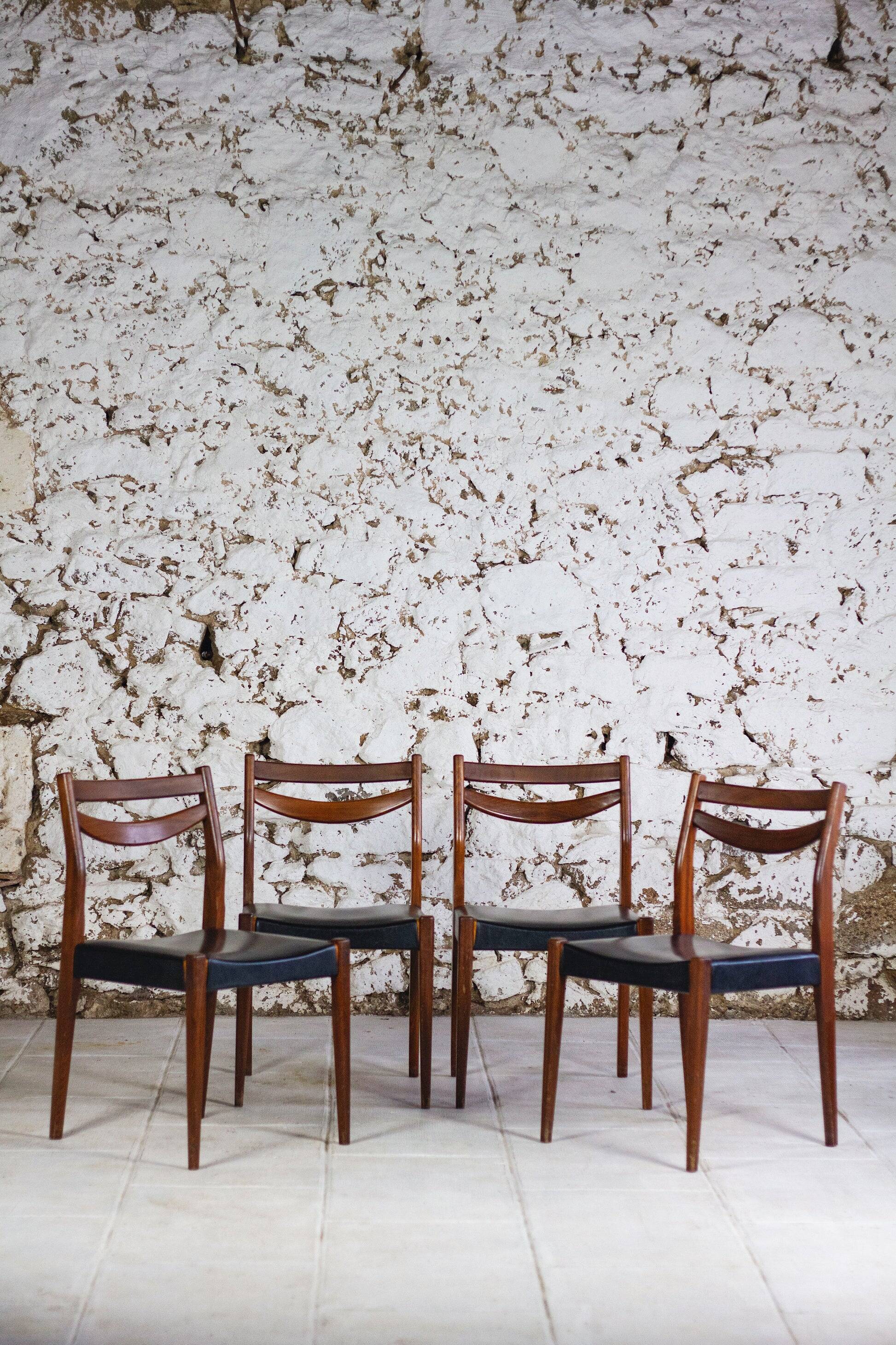 4 vintage Scandinavian chairs in teak and imitation leather, 1960