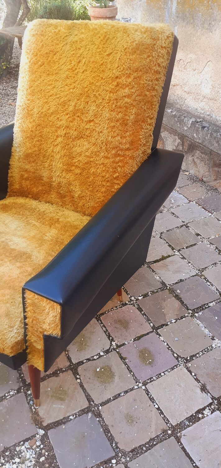 Pair of vintage 60s armchairs in black imitation leather and mustard toffee