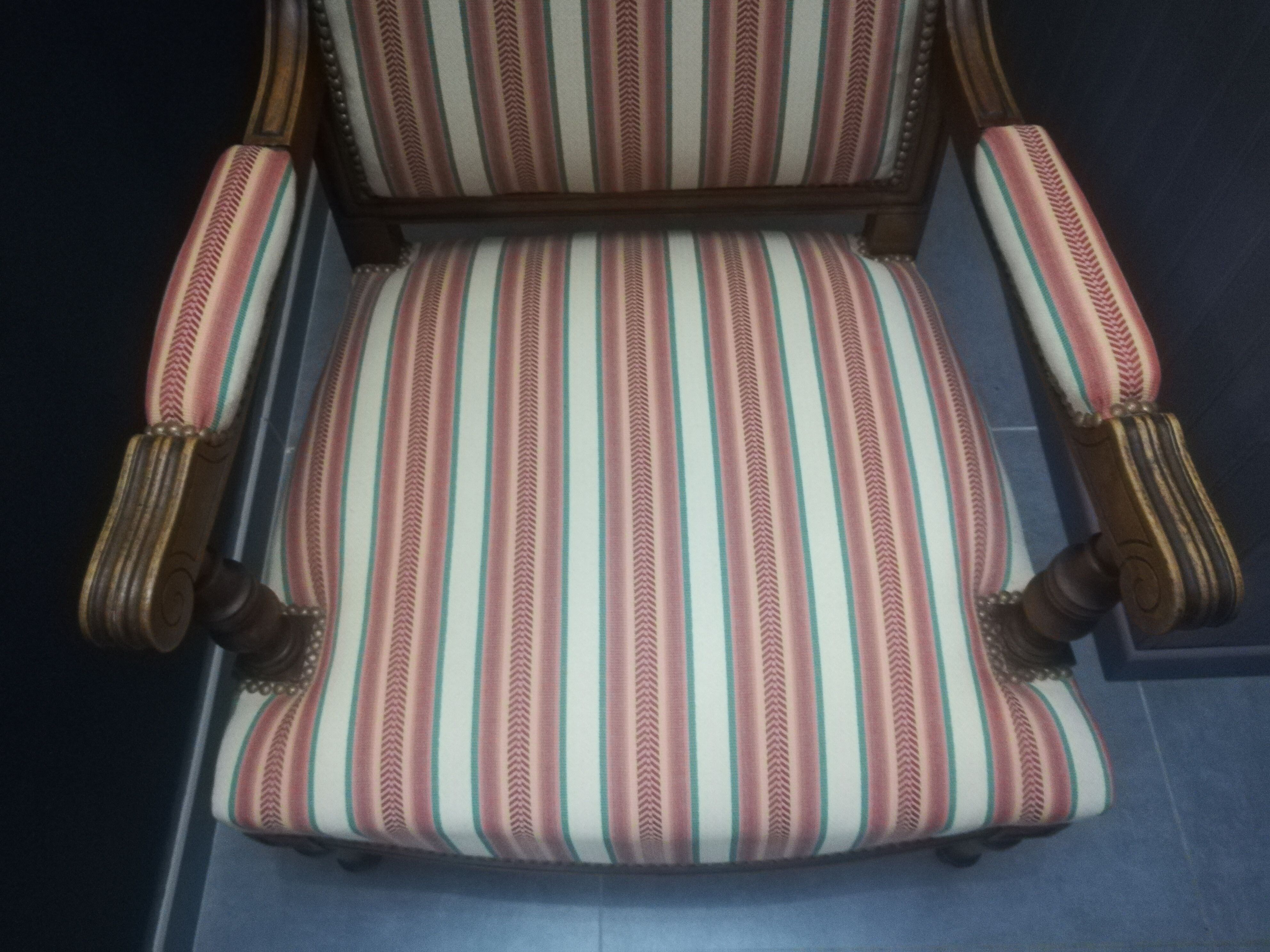 Pair of Louis XVI style walnut armchairs