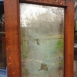 Art Deco door mirror with floral pattern frame