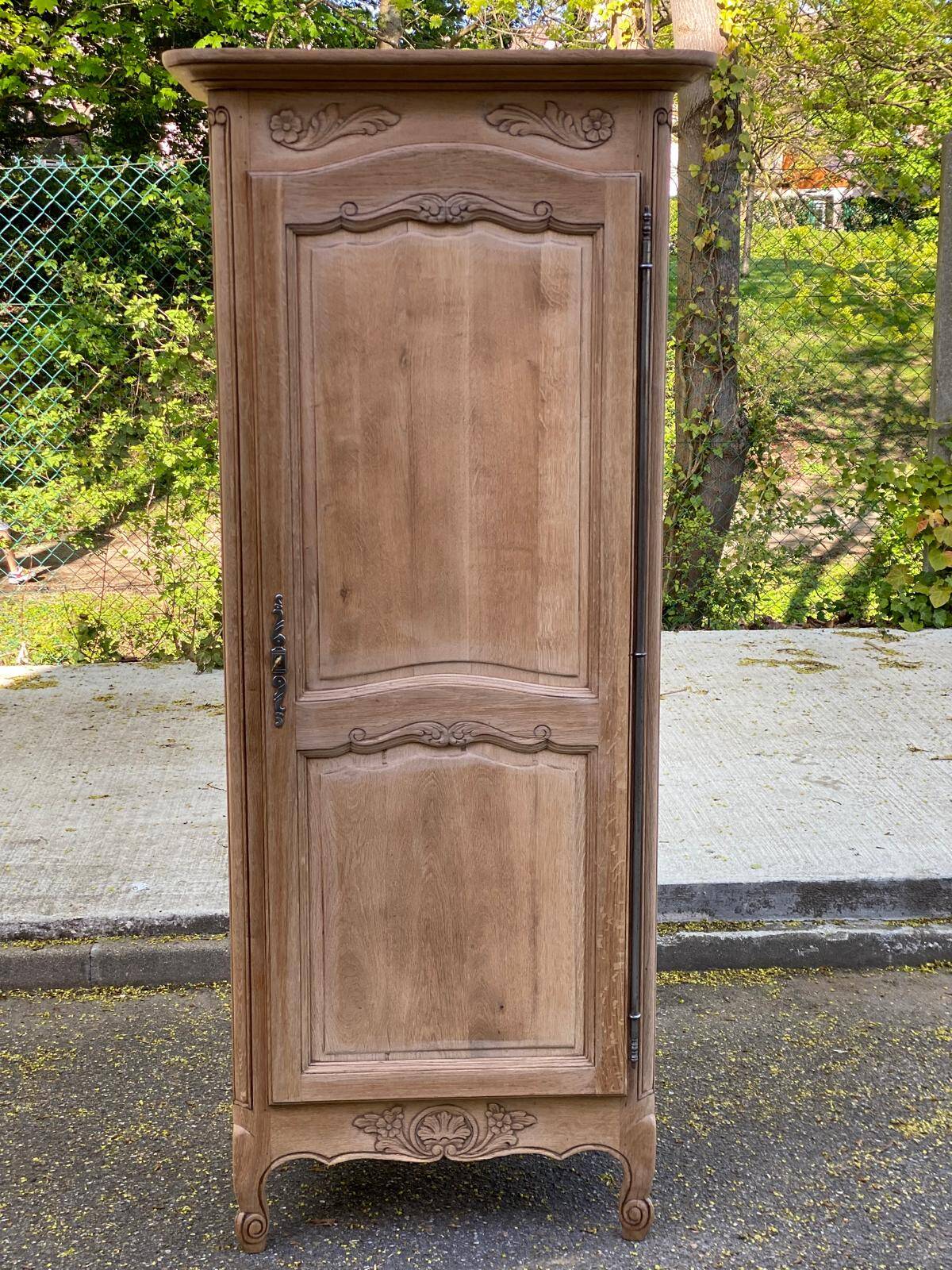 Renovated Louis XV bonnetière dormitory wardrobe in solid oak.