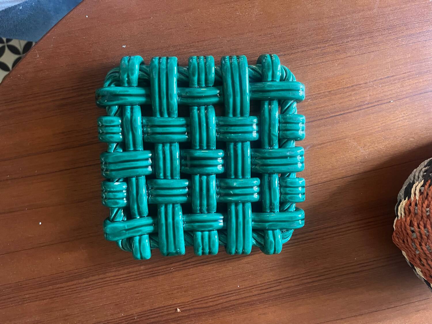 Woven ceramic trivet