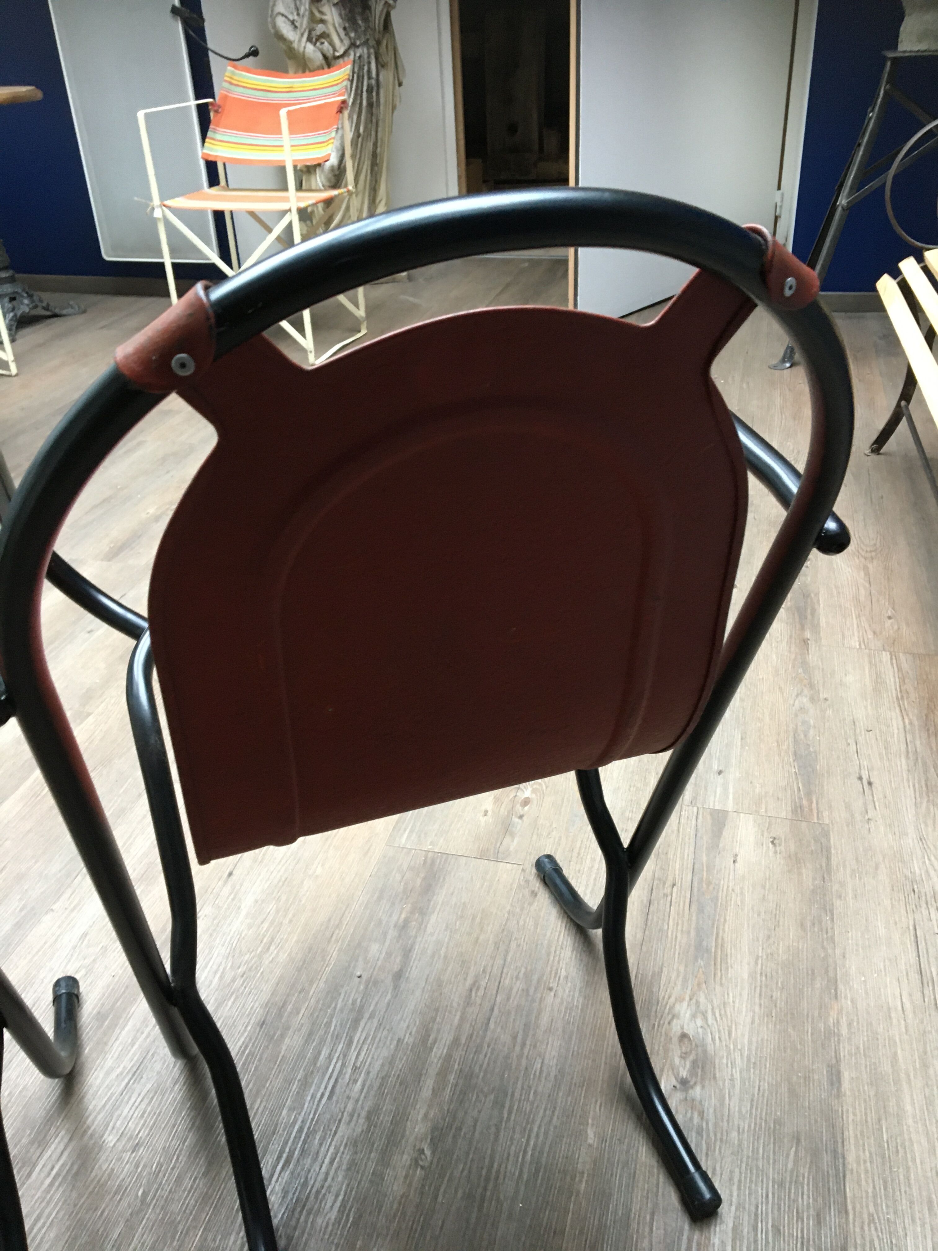 Pair of iron armchairs