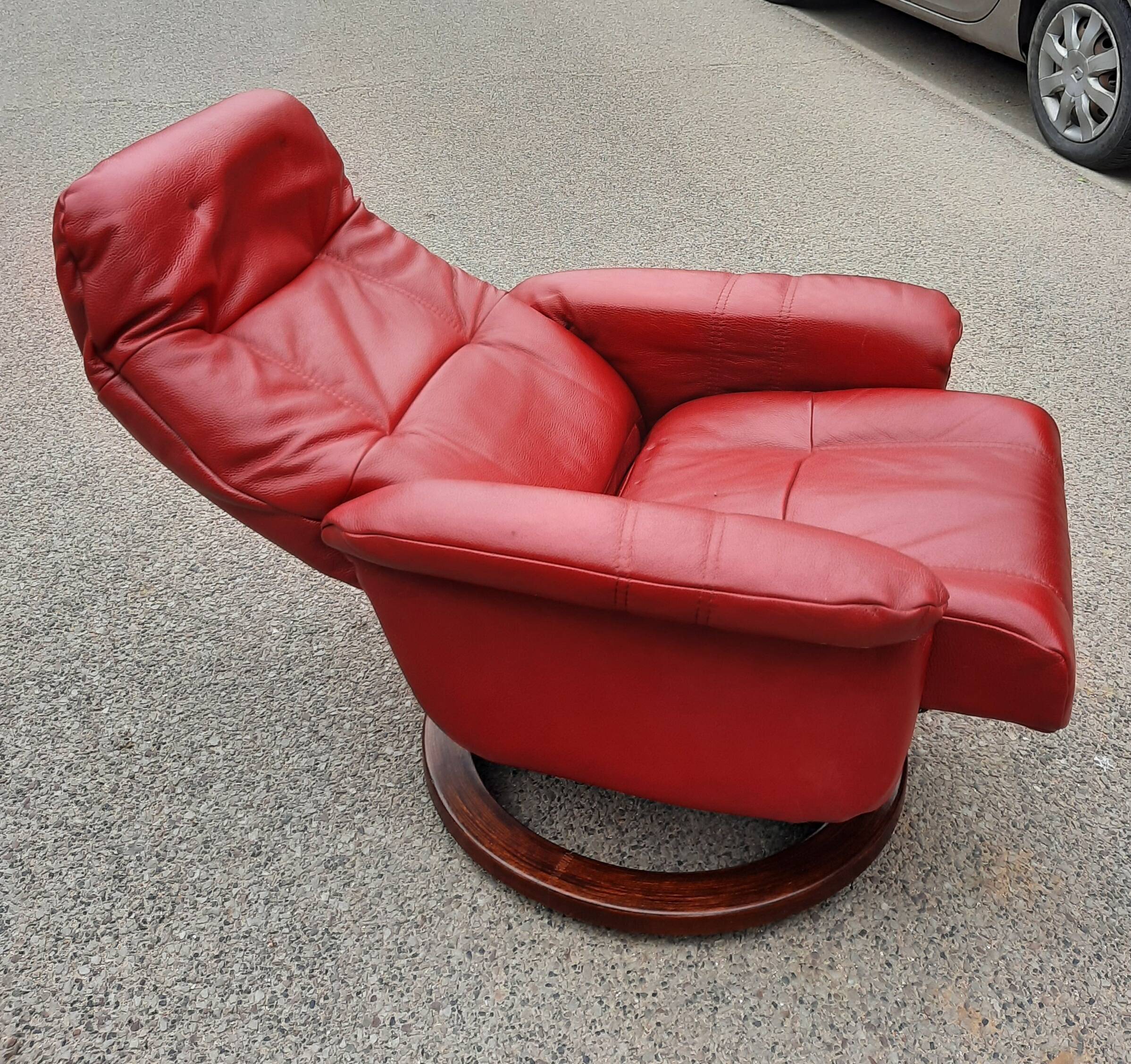 Red leather relax armchair and pouf