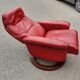 Red leather relax armchair and pouf