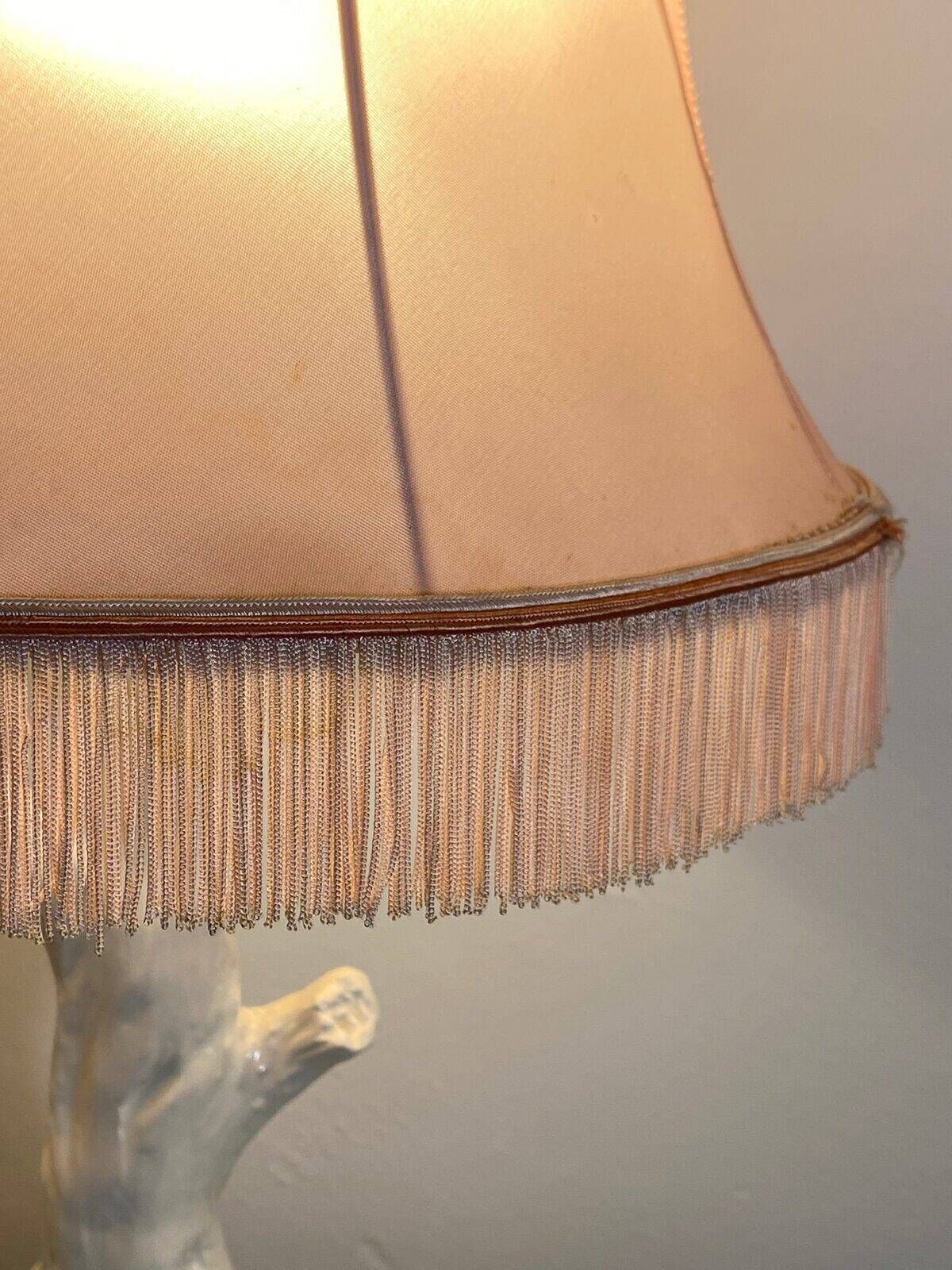 Ceramic lamp with birds, pink fringed shade, 1950s.